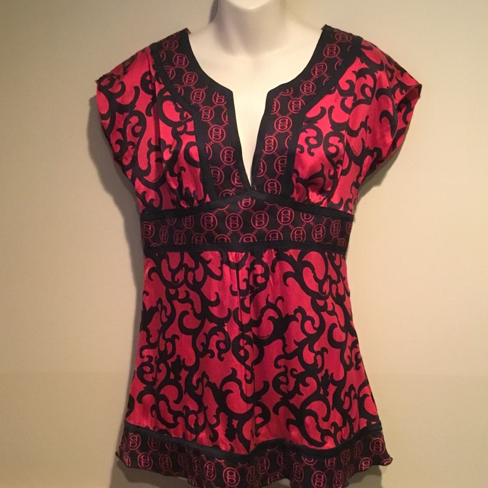 Bebe women’s SZ Medium side zip sleeveless silk blouse